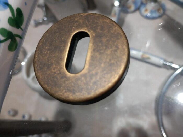 Maniglie (COPPIA di due mezze) porte interne Porcellana bronzo anticato - immagine 3